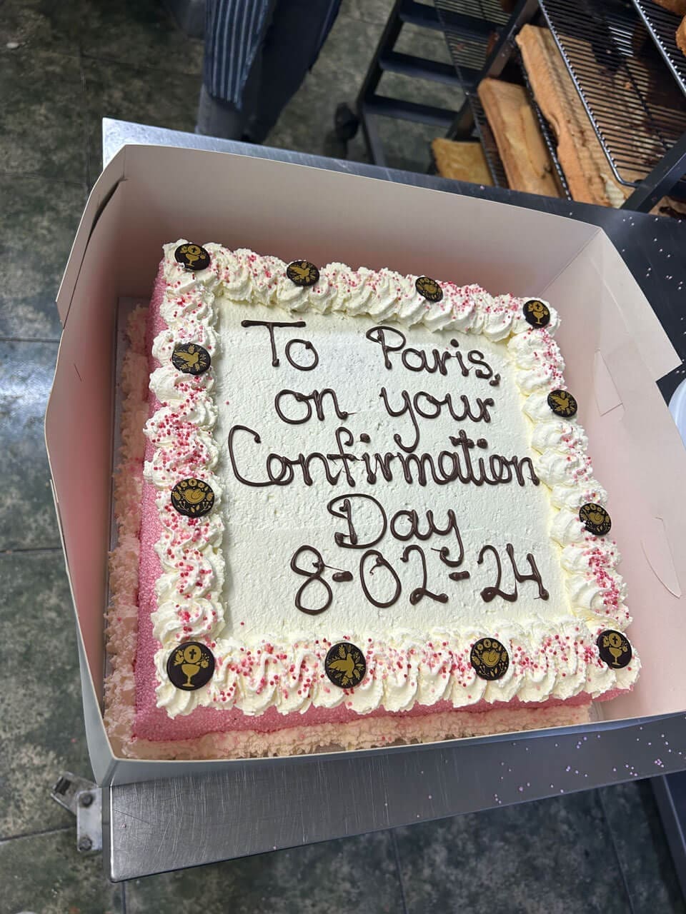 Confirmation sponge cake design with pink sprinkles and cream with decorations Doreens Bakery Athboy