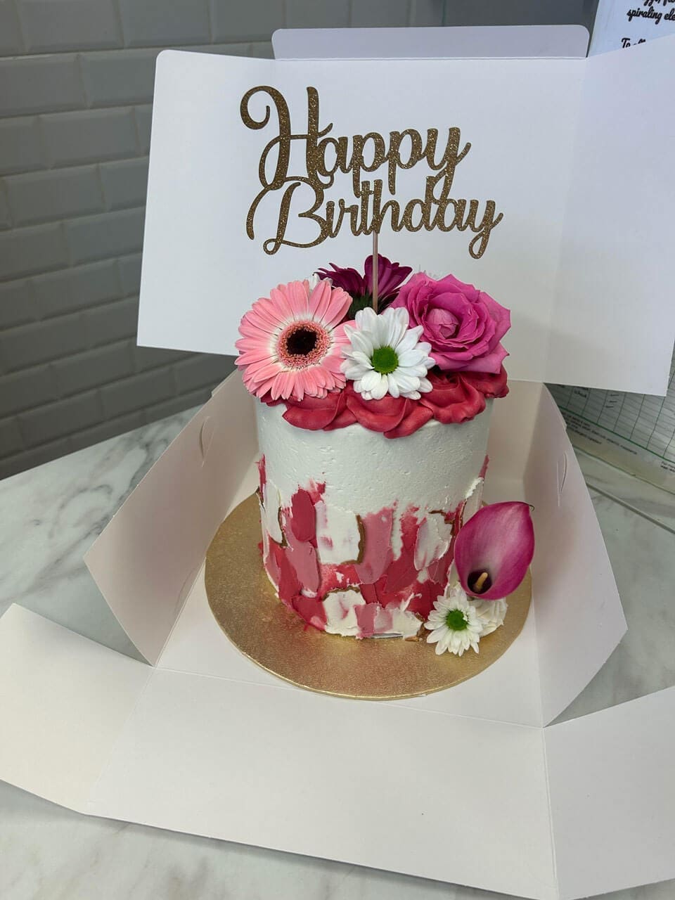 Modern floral birthday cake design with buttercream and flowers decoration Doreens Bakery
